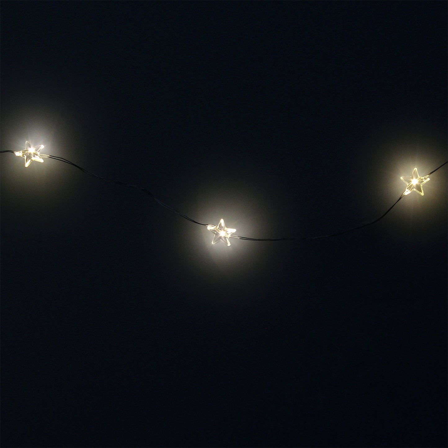 Guirlanda Luzes de Natal Estrelas 20 Leds Cor Branco Quente. Luz de Natal interna e externa IP44 A 3AA Pilhas (não inclusas)